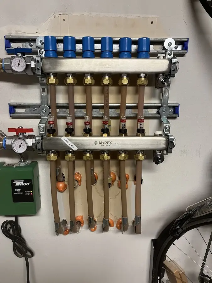 Plumber performing Gas Line Installation at a residential property in Waterville